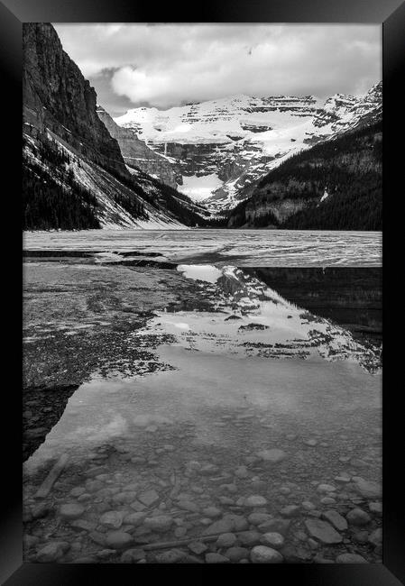 Frozen Lake, Alberta, Canada Framed Print by Mark Llewellyn
