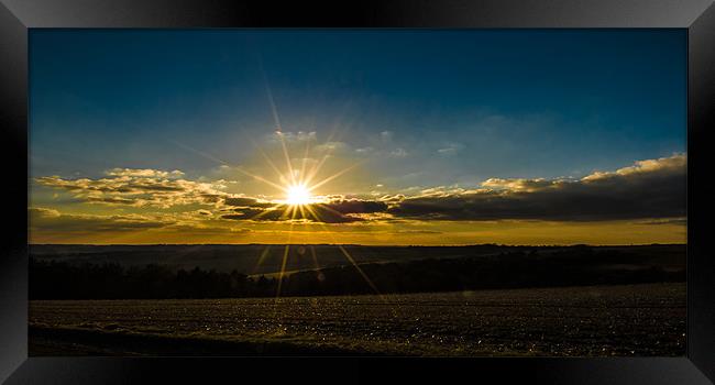 Combe Sunset Framed Print by Mark Llewellyn