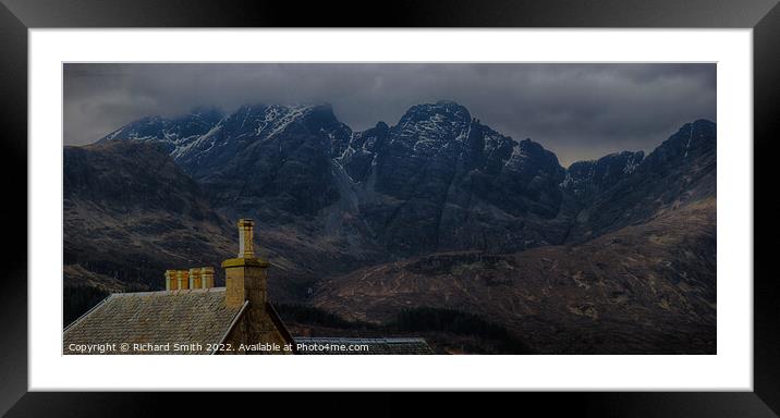 The roof and chimneys of the Torrin Outdoor Centre set against Blaven.  Framed Mounted Print by Richard Smith
