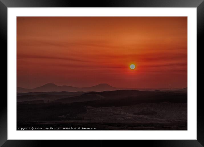 Sun setting through a low haze.  Framed Mounted Print by Richard Smith
