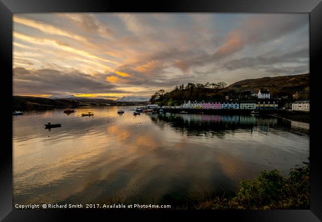 Banded cloud highlights Portree pier Framed Print by Richard Smith
