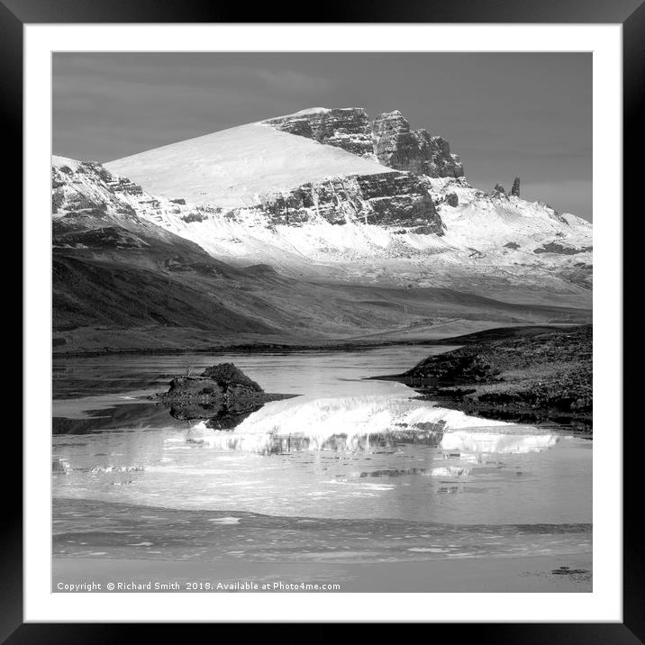 The Storr partially reflected in the Storr Lochs 2 Framed Mounted Print by Richard Smith