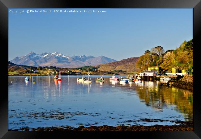 Portree sea loch with yachts and the Cuillin hills Framed Print by Richard Smith