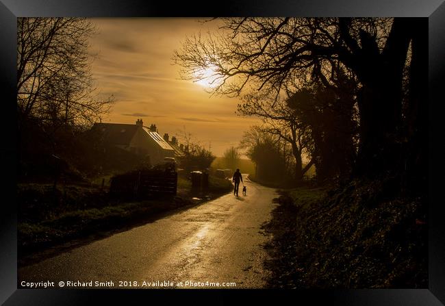 Walking the dog on a hazy winter's morning Framed Print by Richard Smith