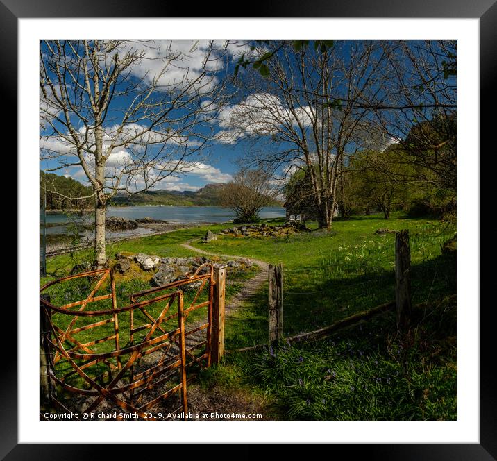 Through a kissing gate to a holiday home by a Loch Framed Mounted Print by Richard Smith