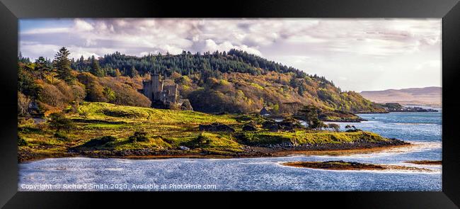 Dunvegan castle, Isle of Skye, nestled amongst the woodland autumn colours. Framed Print by Richard Smith