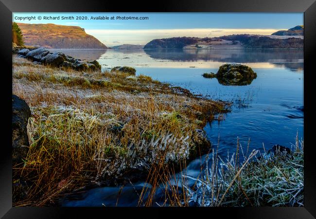 A wee burn flows into Loch Portree on the high tide. Framed Print by Richard Smith