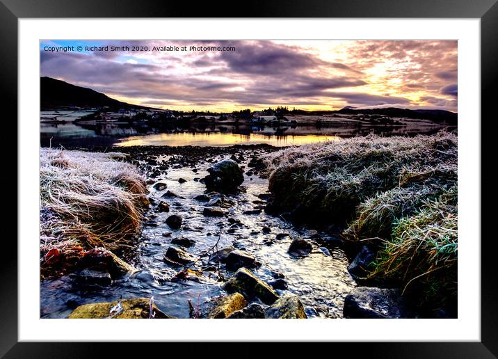 A burn flowing into Loch Portree on a freezing December day. Framed Mounted Print by Richard Smith
