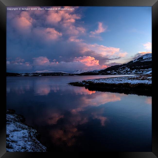 Reflected sunset colour  bounces off cloud and loch. Framed Print by Richard Smith