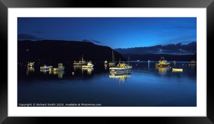Vessels at peace on moorings in Loch Portree during the blue hour. Framed Mounted Print by Richard Smith