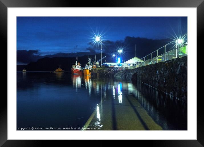 Fishing boats moored to the end of the pier at the blue hour. Framed Mounted Print by Richard Smith