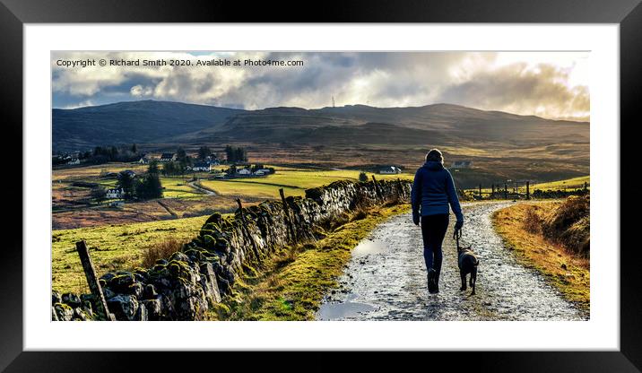 Clare taking Lucy for a walk. Framed Mounted Print by Richard Smith