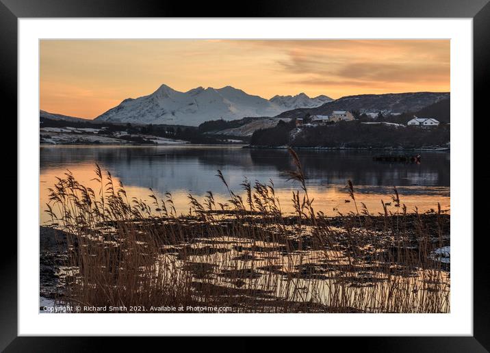 Cuillin reflections in Loch Portree, reeds in the foreground.  Framed Mounted Print by Richard Smith