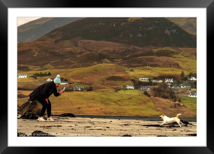 Photographing your companion at the beach. Framed Mounted Print by Richard Smith