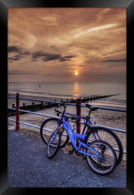 Bike Ride at Sunset Framed Print by Ian Mitchell