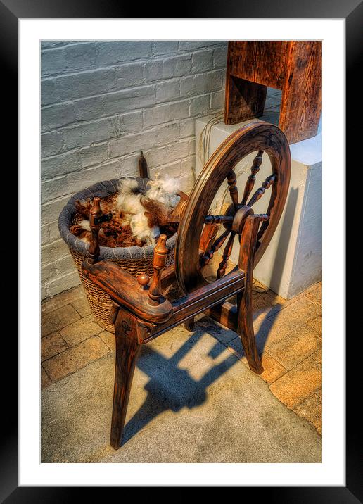Spinning Wheel Framed Mounted Print by Ian Mitchell