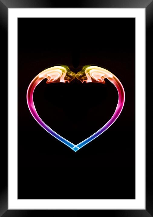 Coloured heart on black Framed Mounted Print by Steve Purnell