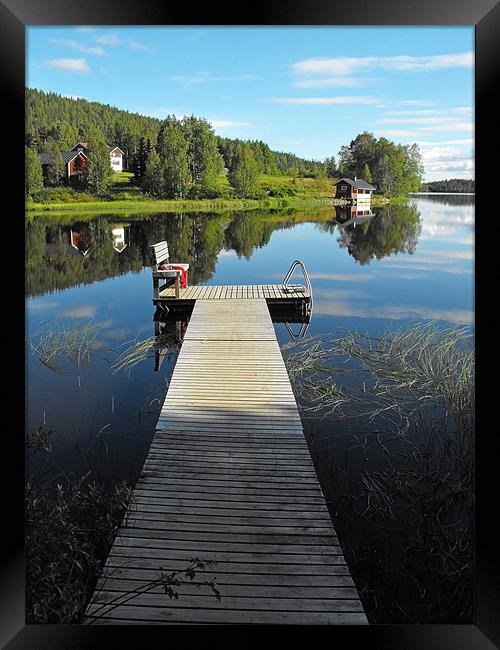Finnish lake in the late afternoon Framed Print by Jutta Klassen