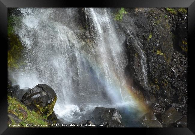 Rainbow at the bottom of a waterfall at Skaftafell Framed Print by Jutta Klassen
