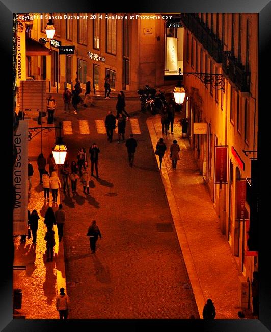 Lisbon Street At Night Framed Print by Sandra Buchanan