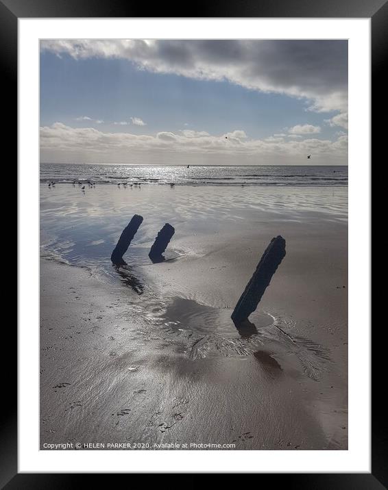 Old pipe supports on Jersey Marine Beach Framed Mounted Print by HELEN PARKER