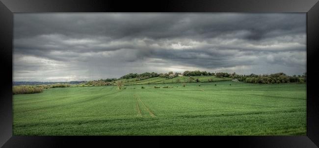 Storm Clouds Framed Print by Jon Fixter