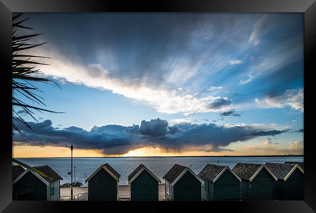 Stormy Sunset at Sea Framed Print by Ian Johnston  LRPS