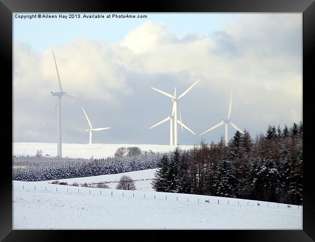 Wind Turbines in Snow Framed Print by Aileen Hay