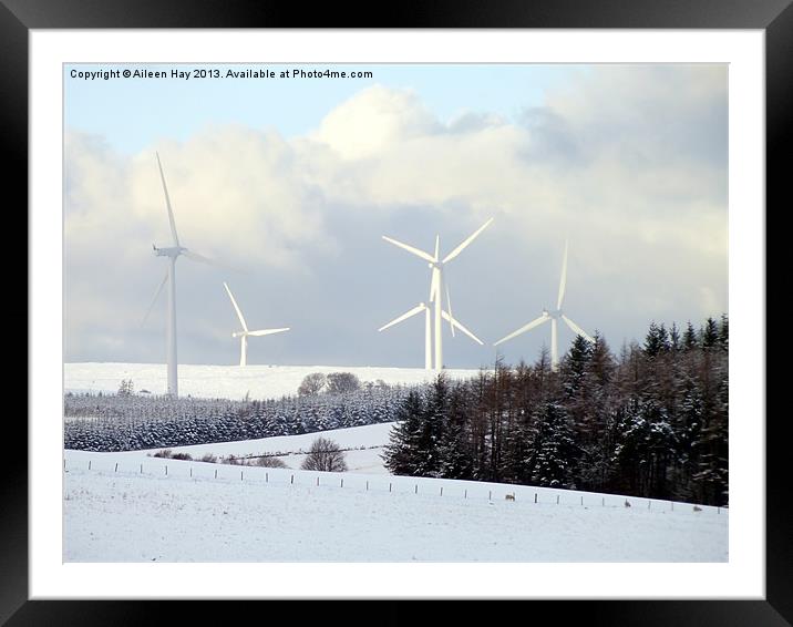 Wind Turbines in Snow Framed Mounted Print by Aileen Hay