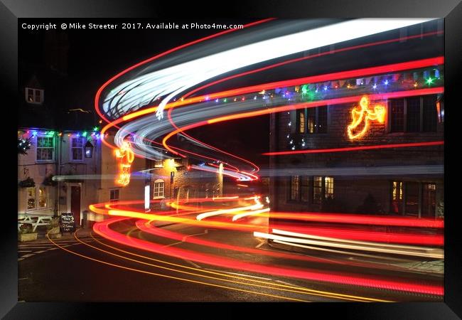 Christmas light trails Framed Print by Mike Streeter