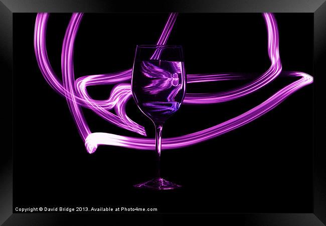 Glass with Purple Swirl Framed Print by David Bridge