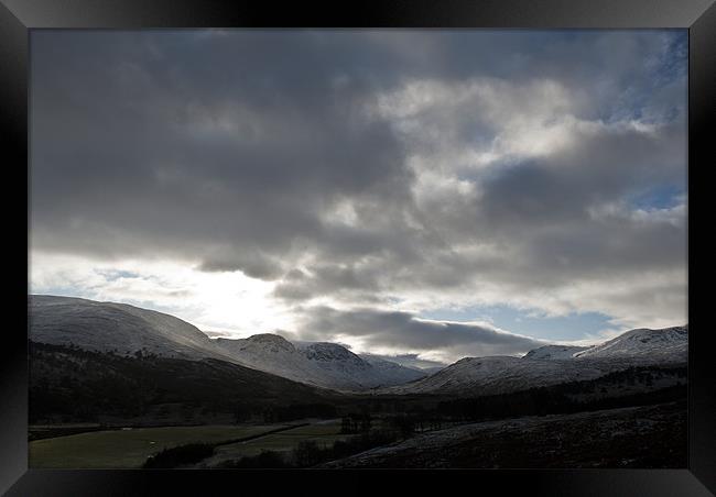 Snowy hills of Glen Lyon Framed Print by Ian Potter