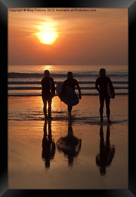 Surfers at Sunset Framed Print by Mary Fletcher