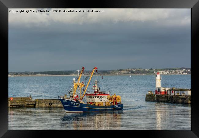 Fishing Boat returns to Newlyn Framed Print by Mary Fletcher