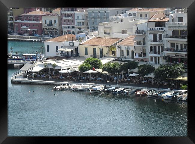 The Harbour at Agios Nikolaos Framed Print by Rodney Leith