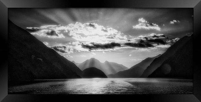 Sunset over Doubtful Sound Framed Print by Paul Want