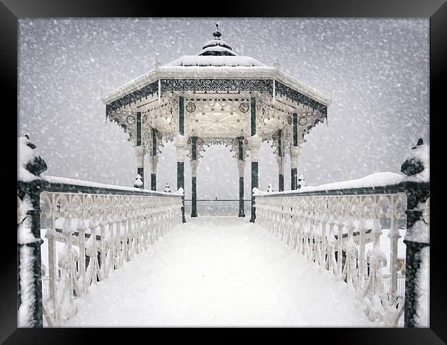 Bandstand in the snow Framed Print by Terry Busby