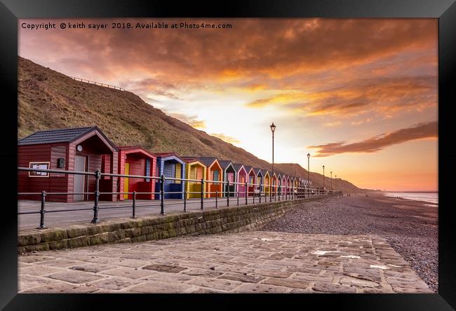 Saltburn beach huts at sunset Framed Print by keith sayer