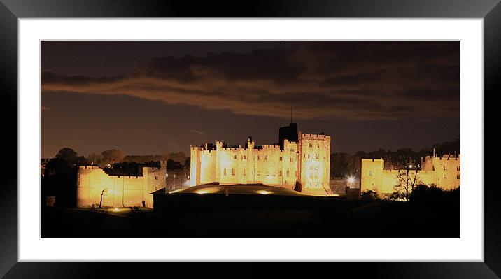 Alnwick Castle at night Framed Mounted Print by Kevin Duffy