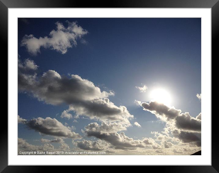 Cloudy blue sky Framed Mounted Print by David Basset