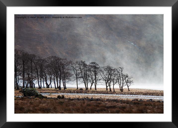 Storm clouds gathering in Glen Etive in the Scottish Highlands near to GlenCoe Framed Mounted Print by Peter Stuart