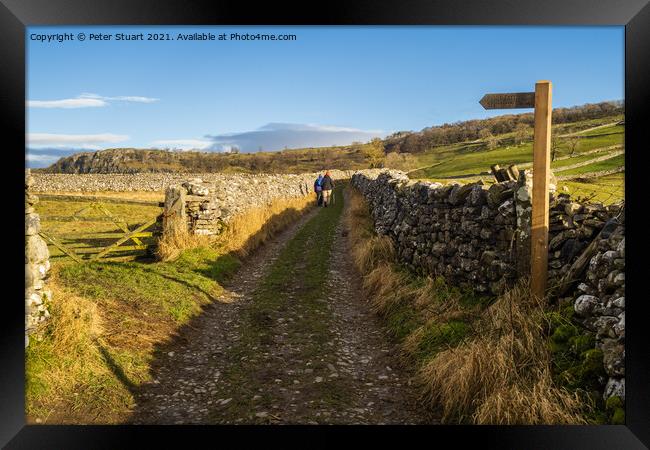 Hill walking between Langcliffe, Attermire Scar and Settle Framed Print by Peter Stuart