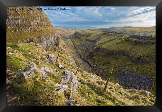 Walking to Malham Tarn via Malham Cove and Watlowes Dry Valley i Framed Print by Peter Stuart