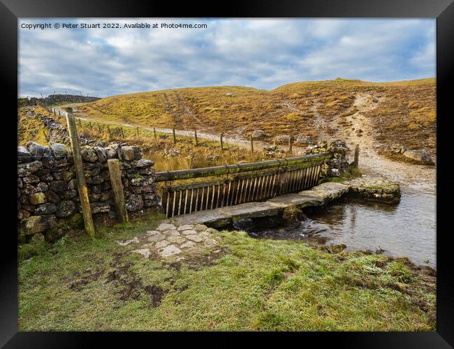 Ford crossing a river on Mastiles Lane near Malham Tarn in the Yorkshire Dales Framed Print by Peter Stuart