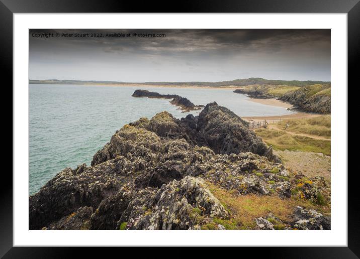 Newborough Warren is an extensive sand dune system and includes  Framed Mounted Print by Peter Stuart