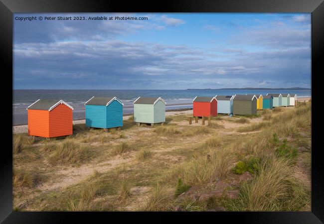 Findhorn Beach Huts Framed Print by Peter Stuart