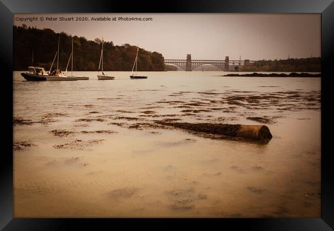 Sailing boats on the Menai Straits near Anglesey Framed Print by Peter Stuart