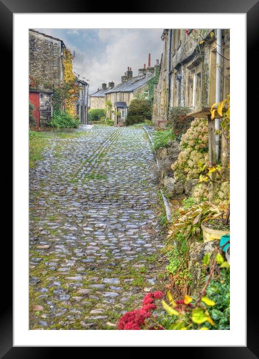 Grassington cobbled street. Framed Mounted Print by David Birchall