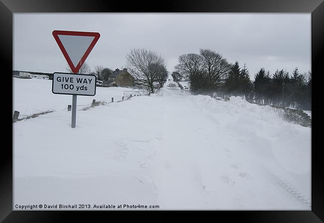 Snowdrift blocking road. Framed Print by David Birchall