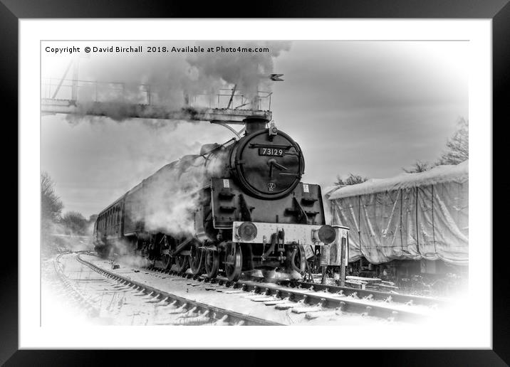 Steam locomotive 73129 in snow. Framed Mounted Print by David Birchall